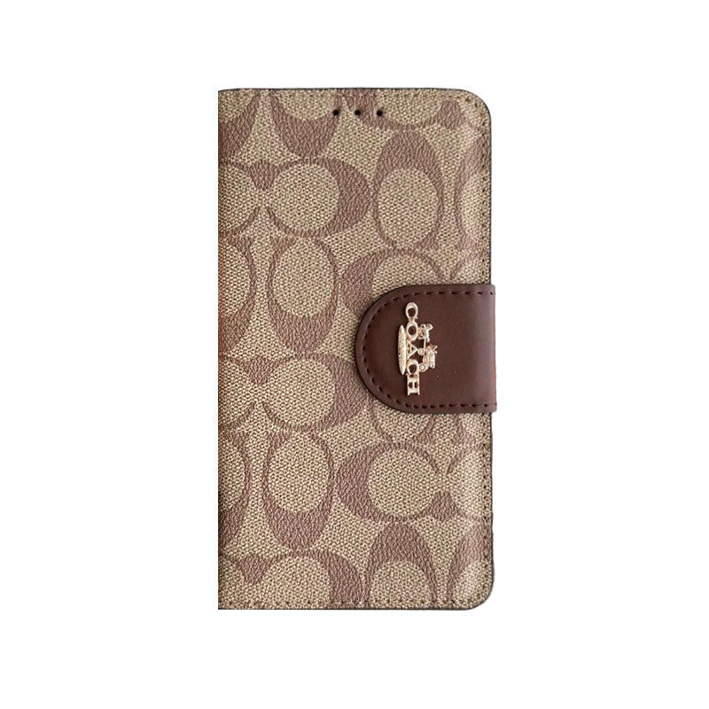 Funda de piel Coach para iPhone con tapa y tarjetero, color negro - PTK241622 